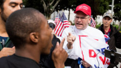 Two protestors argue