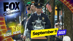 A fireman rings a bell at a 9/11 tribute