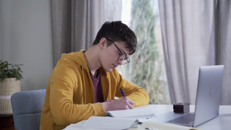 Young man at his desk