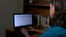 writing at a computer