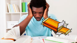 A young man is stressed from studying