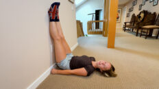 Breleigh puts her feet up on the wall