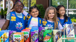 Girl Scouts selling cookies