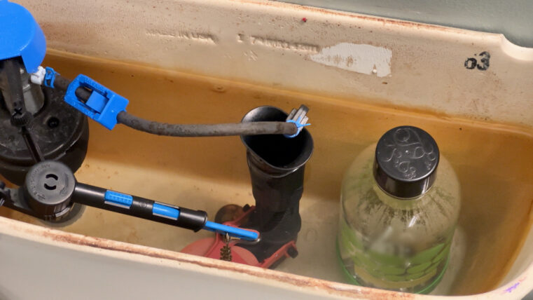 Yep, a jar in the toilet tank